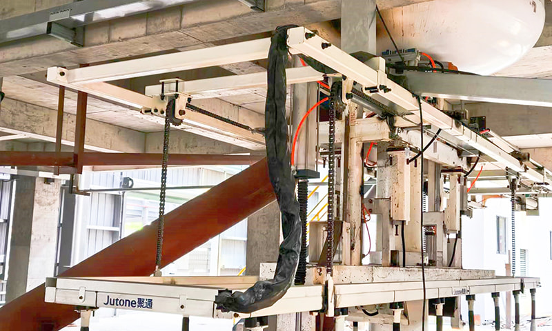 Dispositif de bras coulé de levage